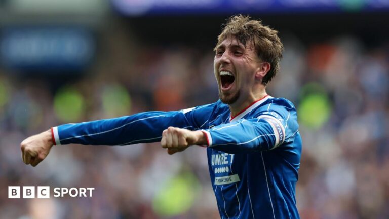 Rangers captain Dan Neil celebrates